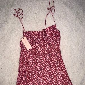 Who I Am red floral dress